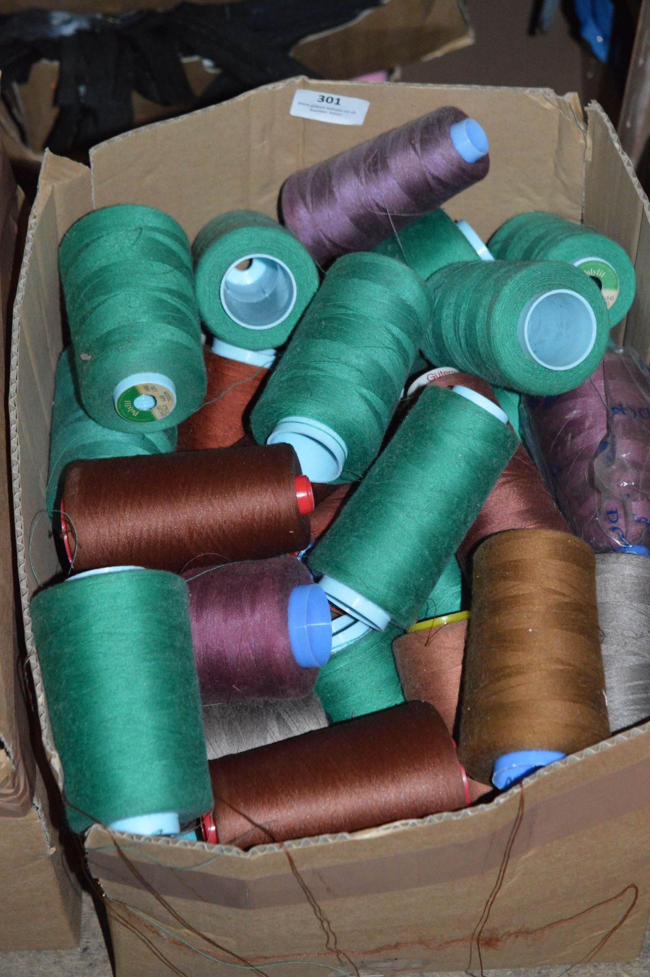 Box Containing Assorted Cones of 120 Cotton Thread