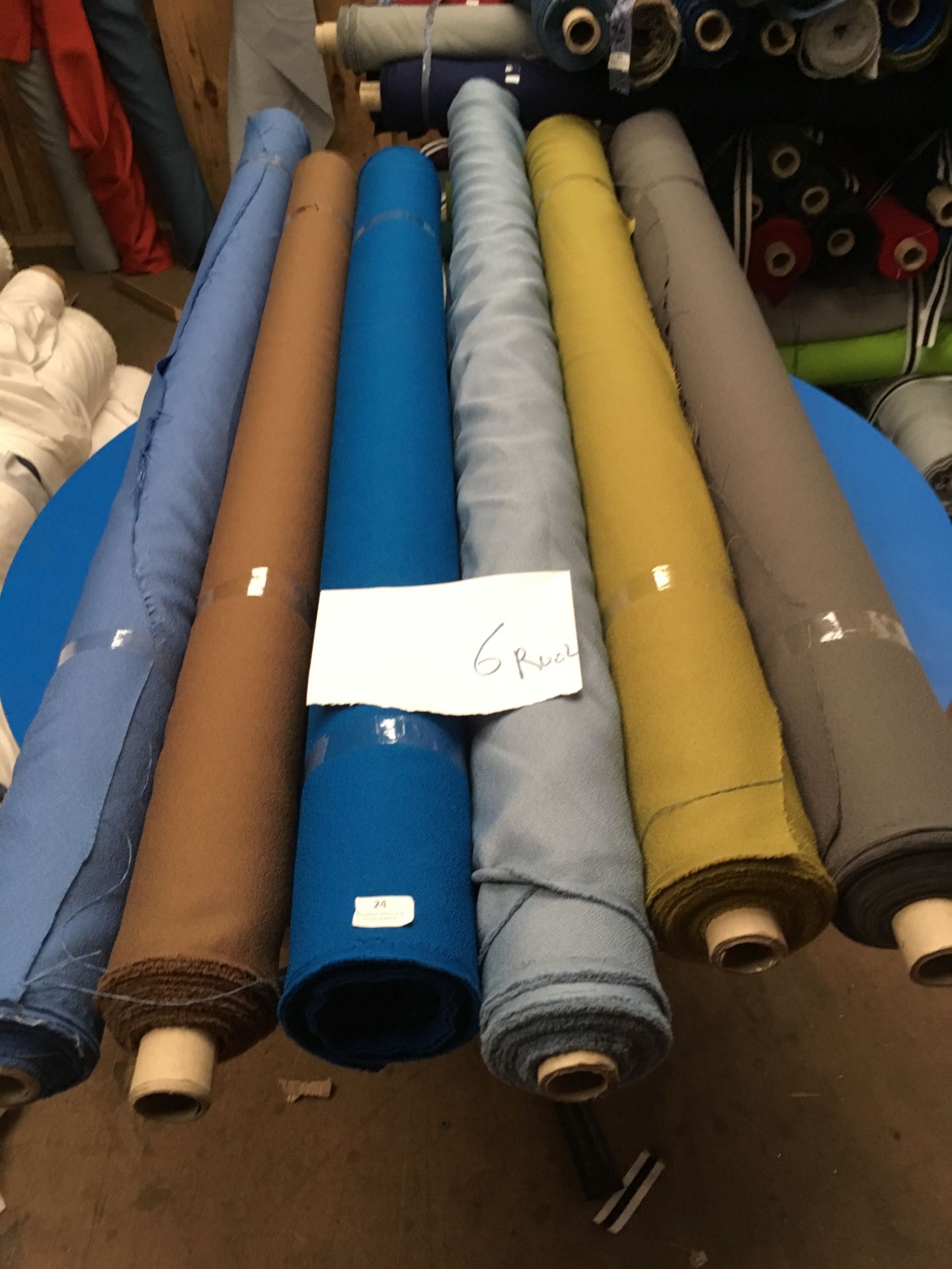 Four Rolls of Polyester Crepe Fabric Assorted Colours and Lengths