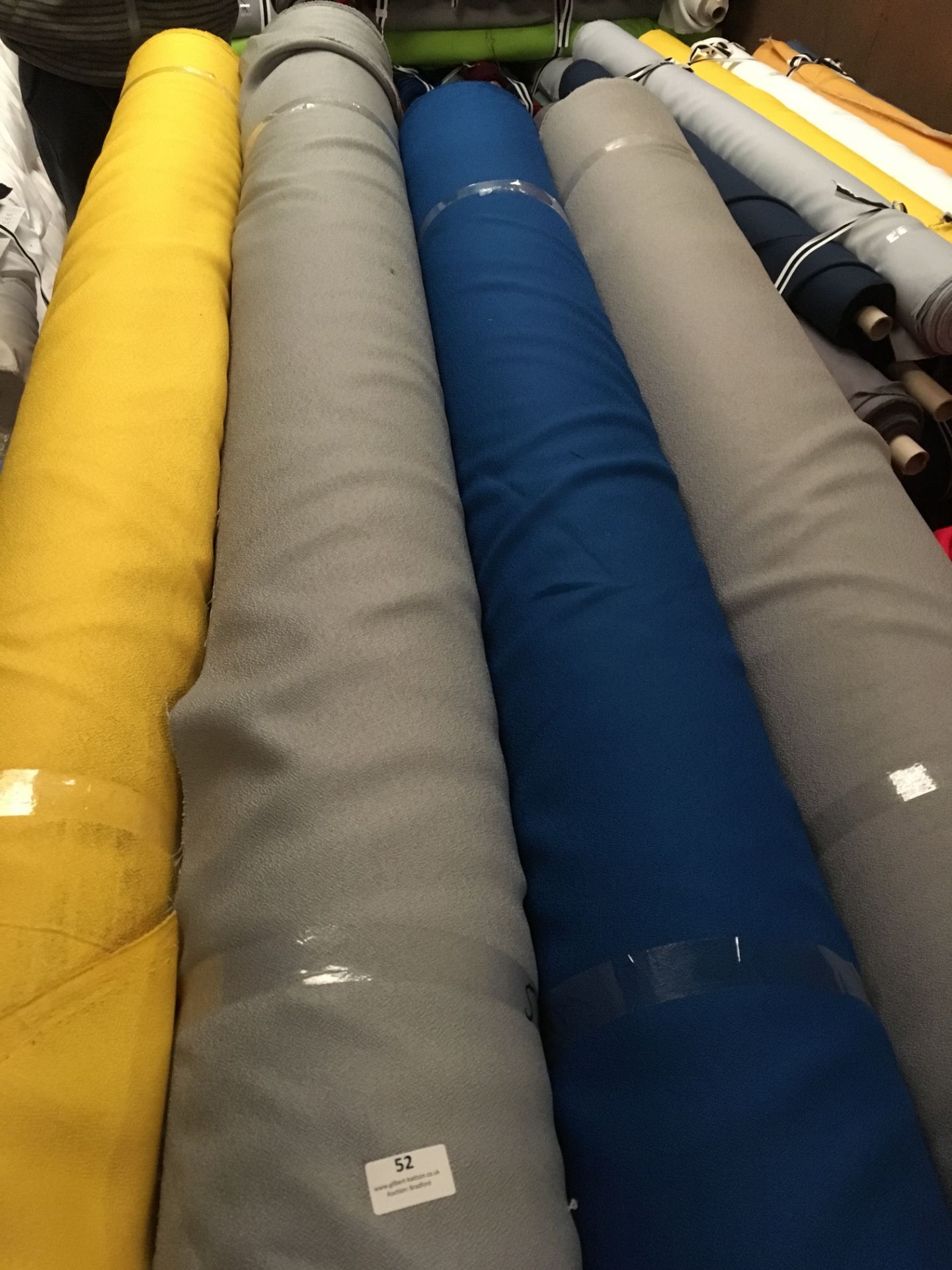 Four Rolls of Polyester Crepe Fabric Assorted Colours and Lengths