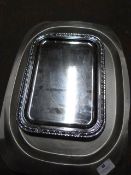 Two Stainless Steel Platters and Four Decorative S