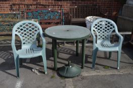 Green Plastic Circular Garden Table and Two Chair