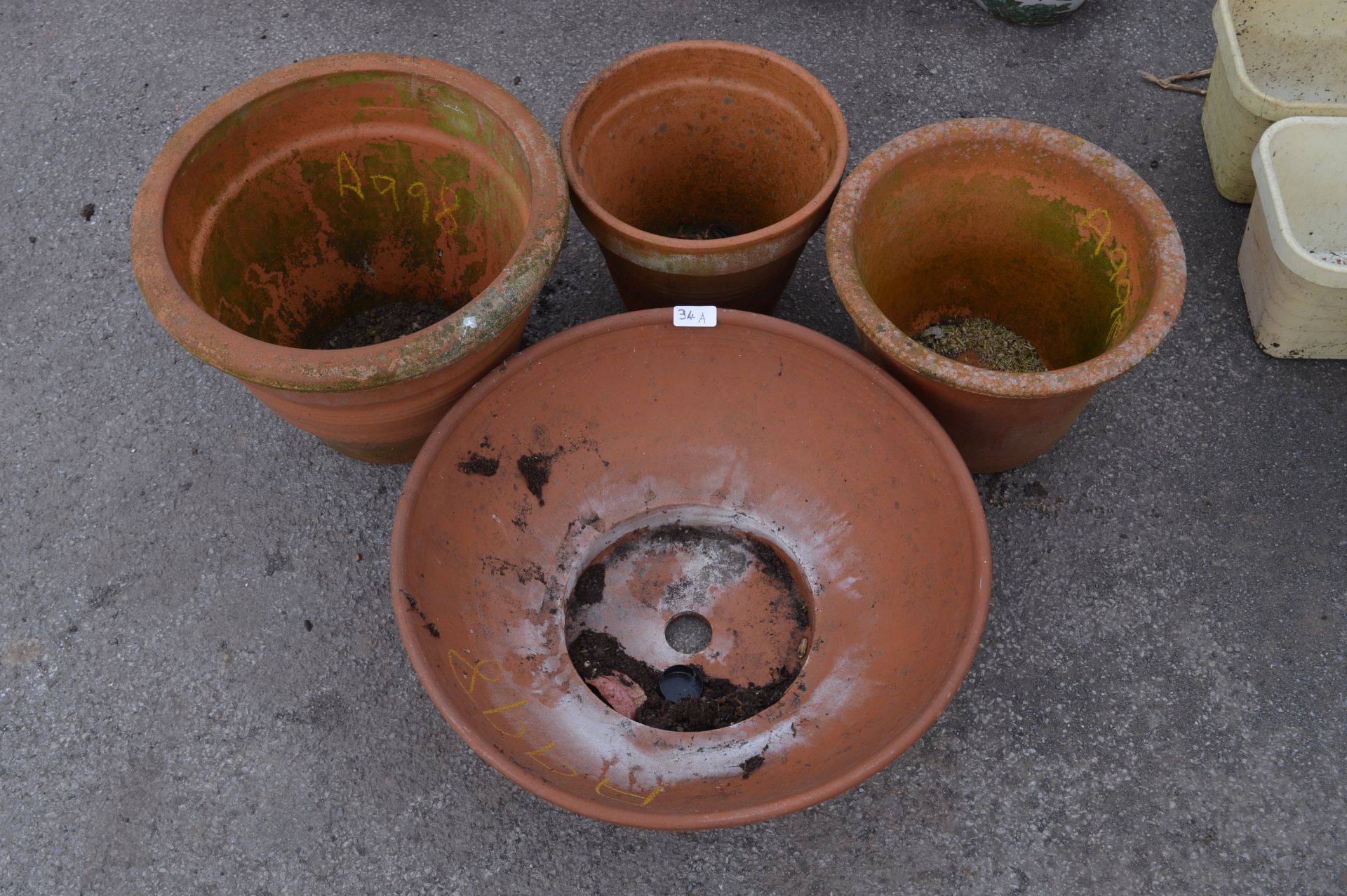 Four Terracotta Plant Pots