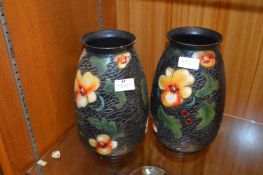 Pair of Floral Decorated Pottery Vases