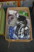 Box Containing a Quantity of Sports Tops