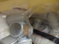 Two Bags of Plastic Pipe Joints, Fittings, etc.