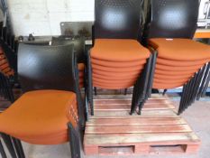 Twenty Five Orange Banqueting Chairs with Black Pl