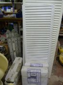 Four Radiators and a Toilet Cistern