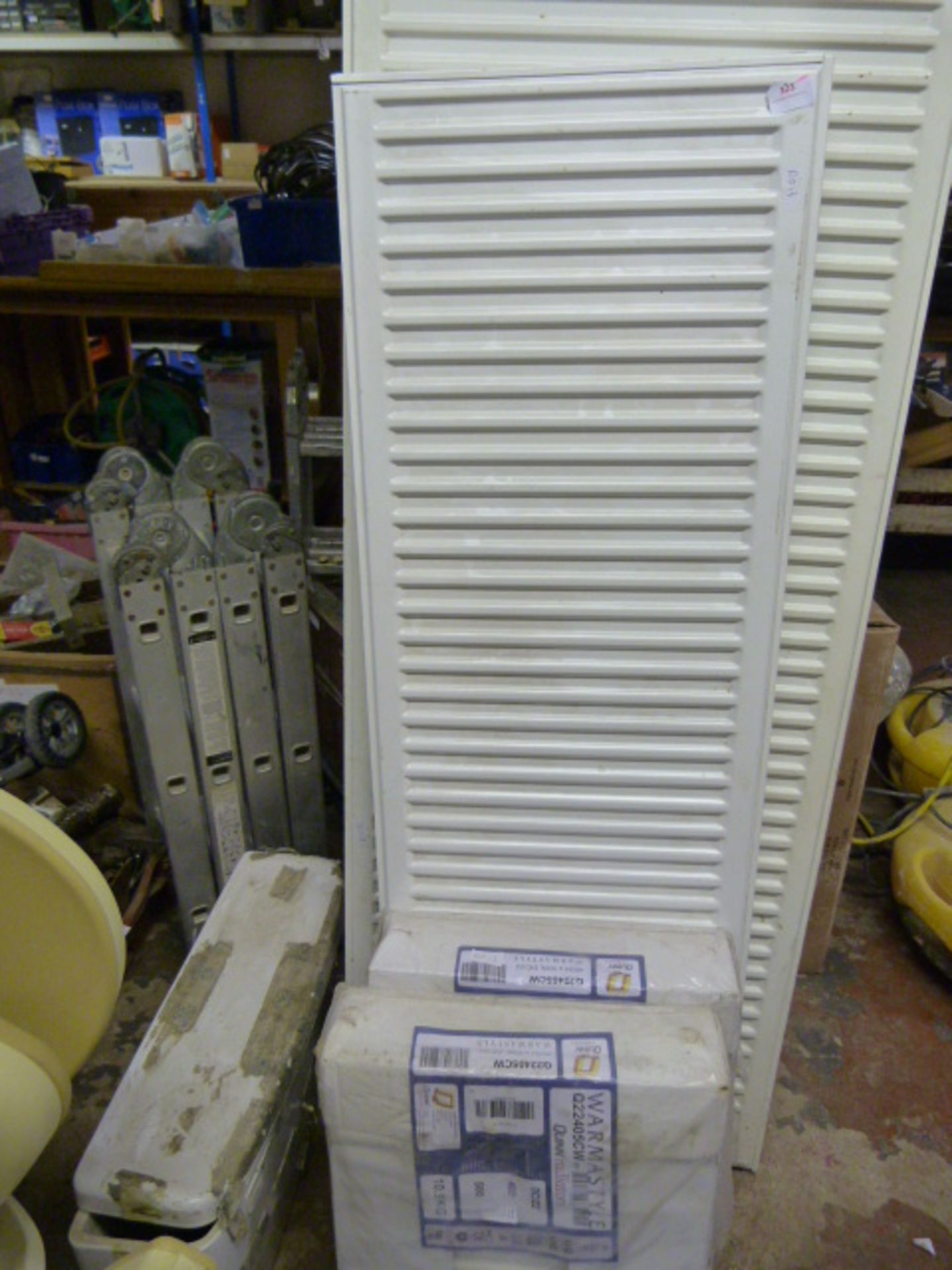 Four Radiators and a Toilet Cistern