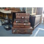 Set of Four Leather Suitcases
