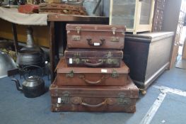 Set of Four Leather Suitcases