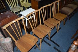 Four Ercol Stickback Dining Chairs