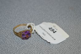 Ladies 9cT Gold Dress Ring set with Purple Flower Stones