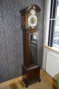 Oak Cased Grandmother Clock with Decorative Brass Face