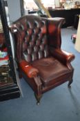 Oxblood Leather High Wingback Buttoned Armchair