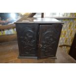 Oak Smokers Cabinet with Carved Panel Doors
