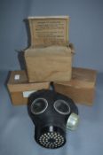 Three Gas Masks with Boxes