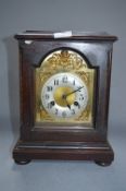 Mahogany Cased Mantel Clock with Brass Face