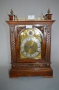 Walnut Cased Mantel Clock with Brass Face and Gallery