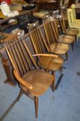Five Ercol Stickback Dining Chairs Including one Armchair