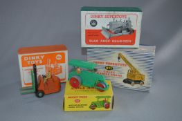 Four Boxed Dinky Toys; Cole's Mobile Crane, Bulldo