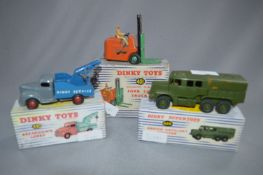 Three Boxed Dinky Supertoys; Forklift Truck, Breakdown Lorry and Artillery Tractor