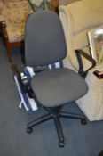 Grey Upholstered Swivel Office Armchair