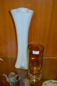 Amber Glass Vase and a White Glass Vase
