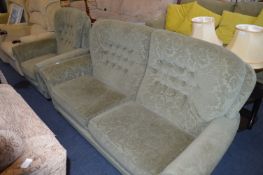 Green Leaf Patterned Sofa and Armchair