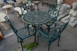 Green Cast Metal Circular Garden Table and Four Ch