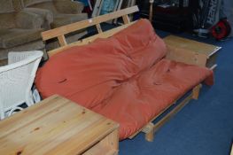 Pine Based Futon with Terracotta Coloured Cushion