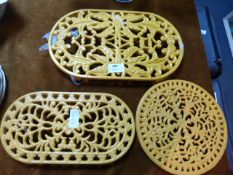 Three Yellow Painted Trivet Stands