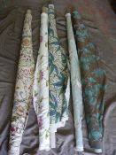 *Five Rolls of Floral Fabric