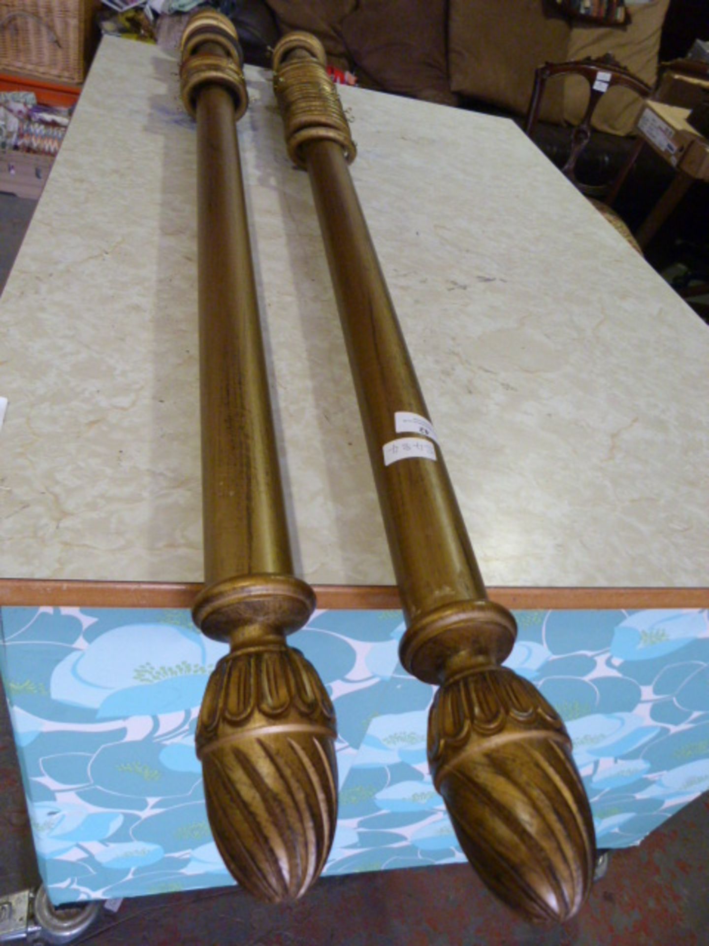 *Pair of Gilt Effect Curtain Poles with Rings