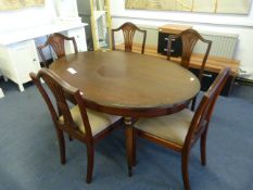Mahogany Oval Topped Extending Dining Table and Fi