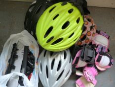 Box of Four Bicycle Helmet, Knee Pads and a Small