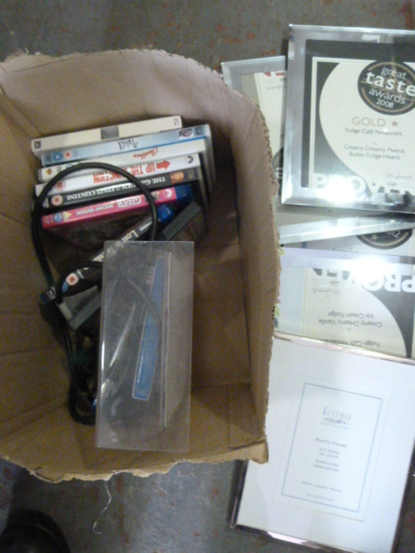 Box of Photo Frames and DVDs