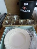 Becks Ice Bucket, Cocktail Glasses and a White Pla
