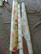 *Four Rolls of Floral Patterned Fabric