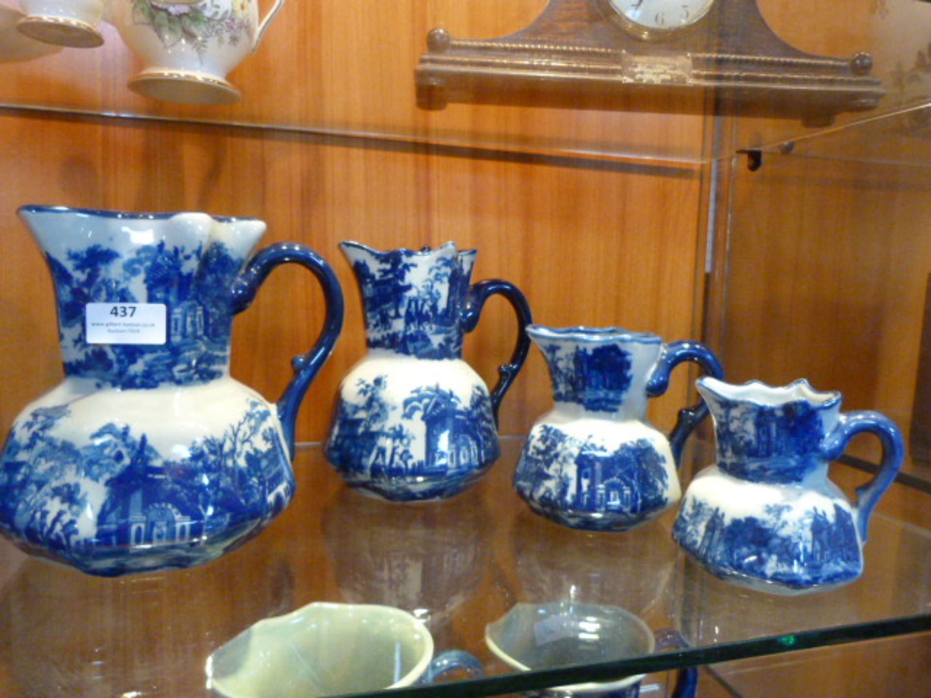 Blue & White Graduating Set of Four Jugs