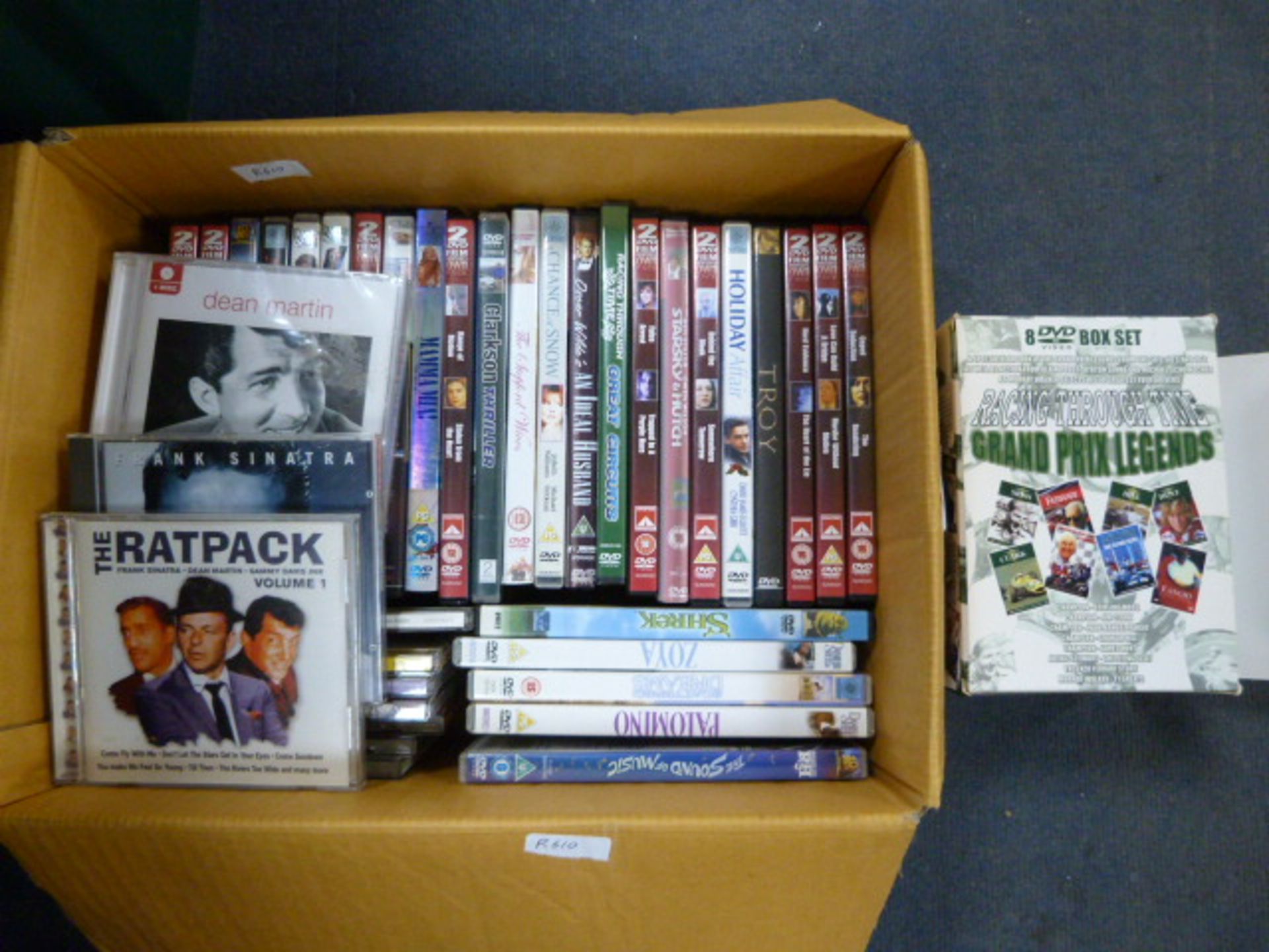 Box of DVDs and CDs