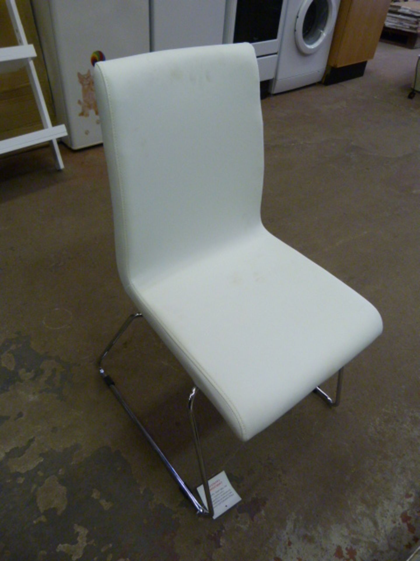 *Four White Polyurethane Chairs