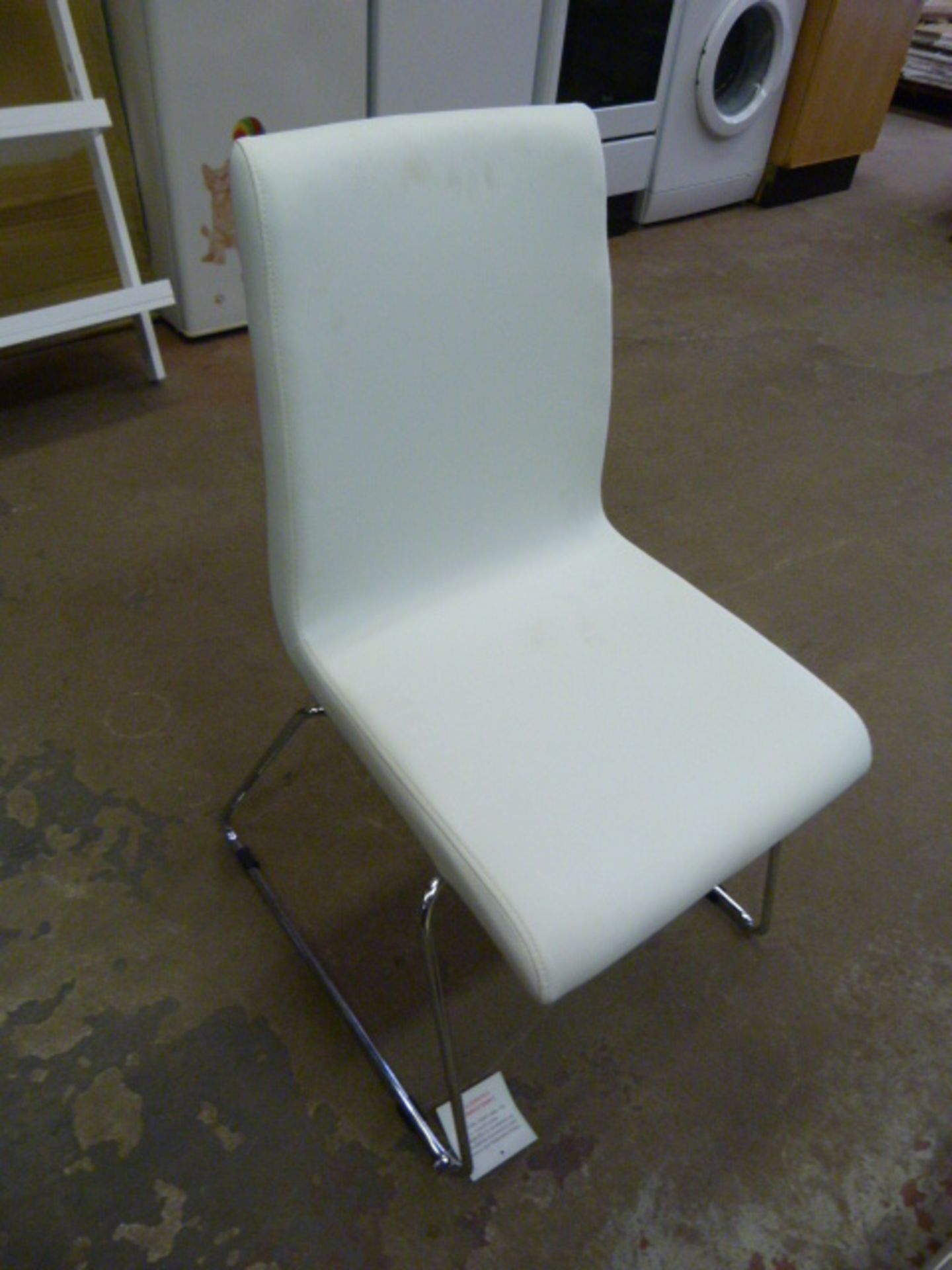 *Four White Polyurethane Chairs