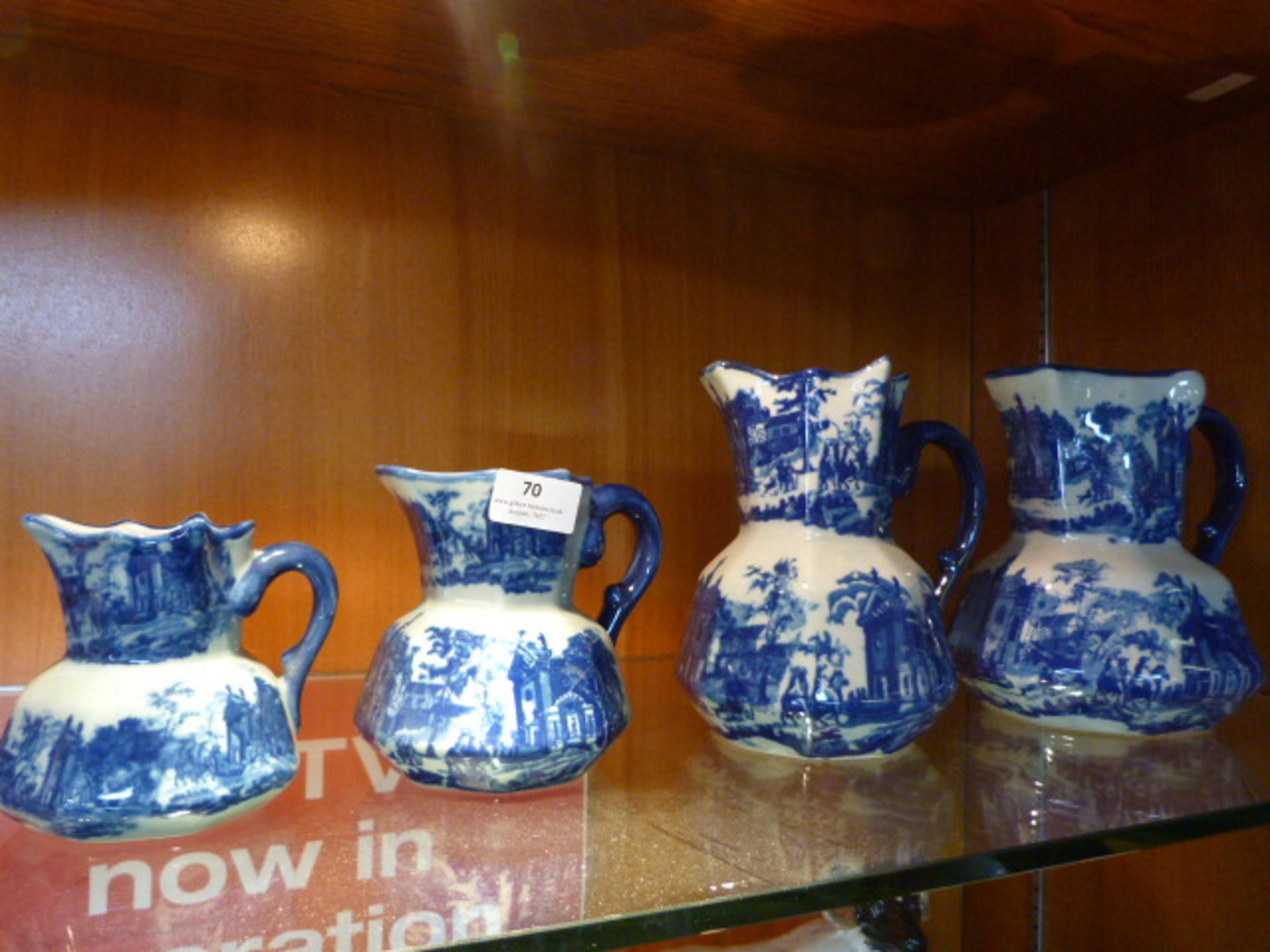 Graduating Set of Four Blue & White Jugs