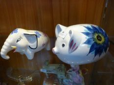 Arthur Wood Elephant Money Bank and a Piggy Bank