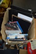 Box of Blu-ray and DVD Films and Photo Frames