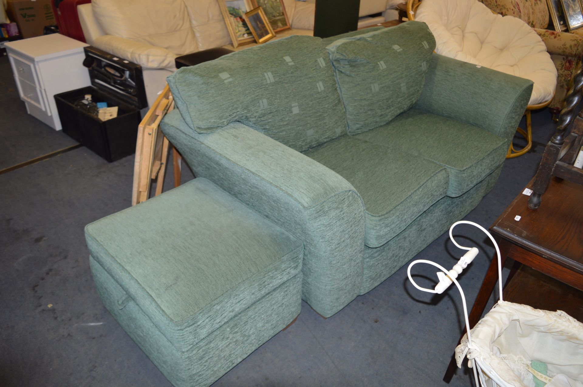 Green Upholstered Two Seat Sofa and a Footstool