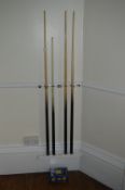 *Pool Cue Rack with Four Cues and a Box of Triangl