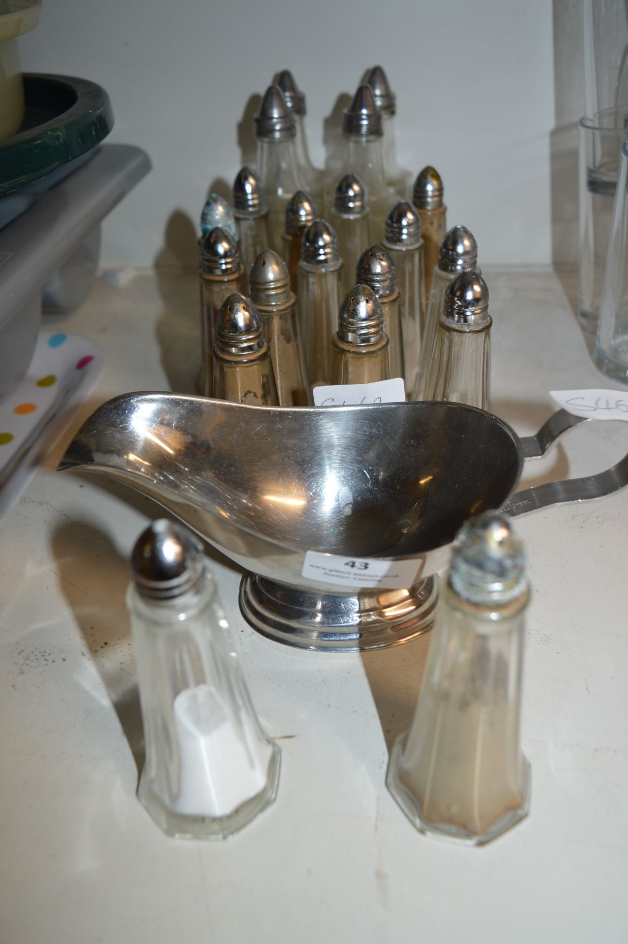 Stainless Steel Sauce Boat and a Quantity of Salt