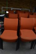 *Twenty Five Orange Upholstered Banqueting Chairs