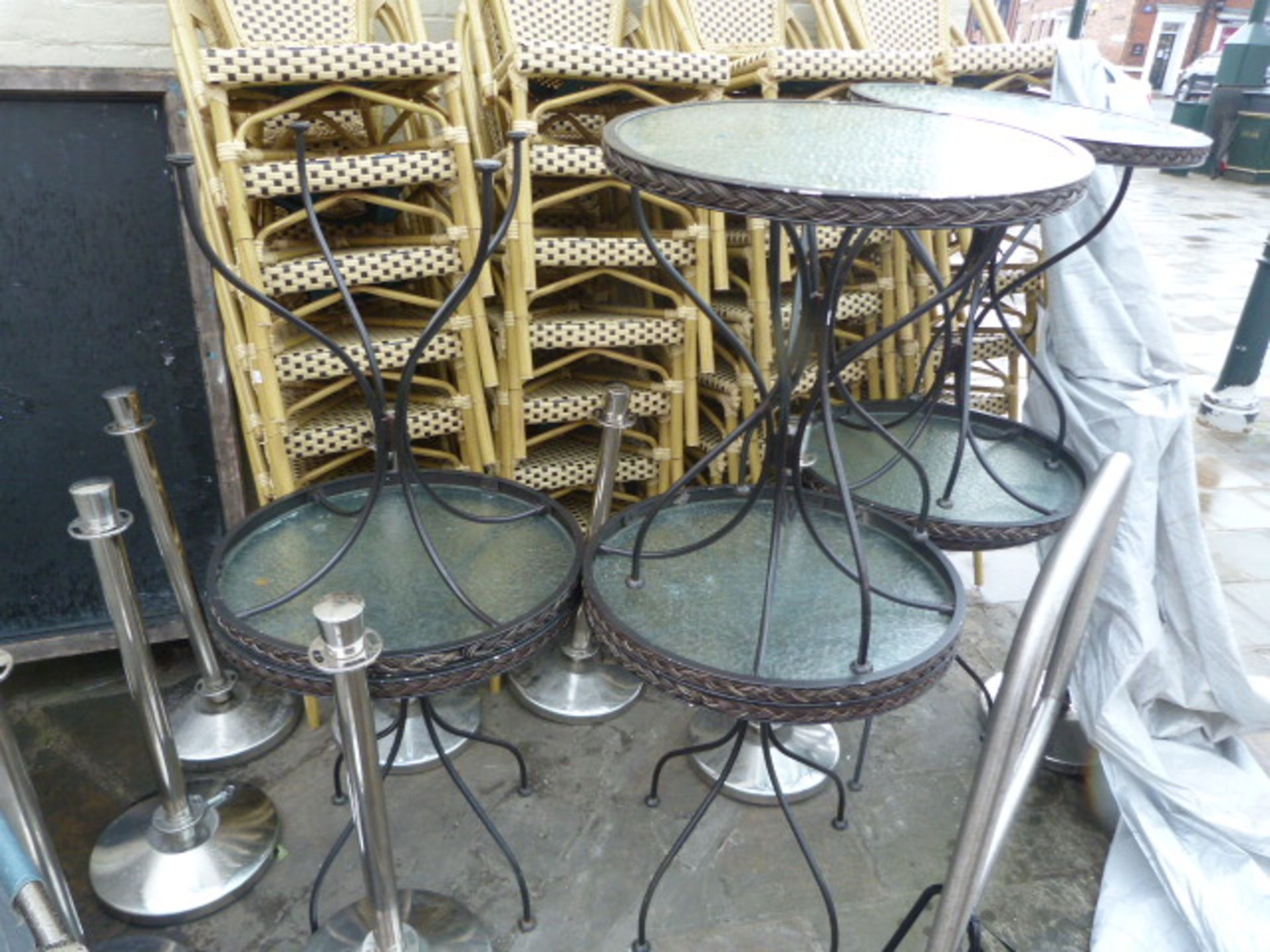 *Eight Glass Topped Circular Tables